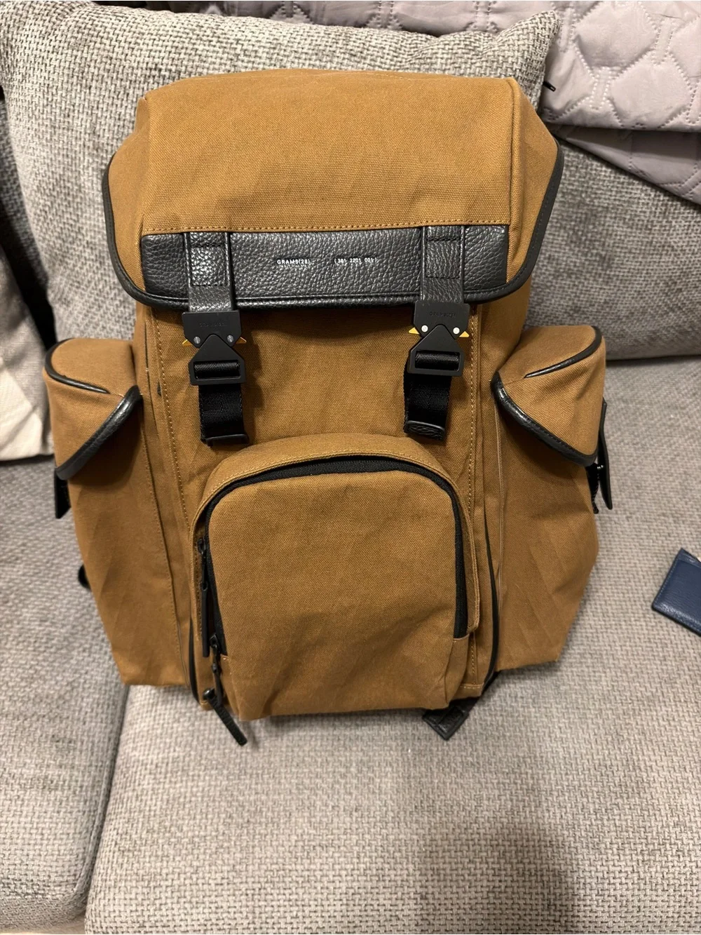 Men's Tan Canvas Travel Backpack with Black Trim